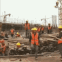 constructor dancing in a construction site